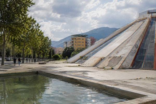 A pale stepped concrete pyramid, Pyramid of Tirana