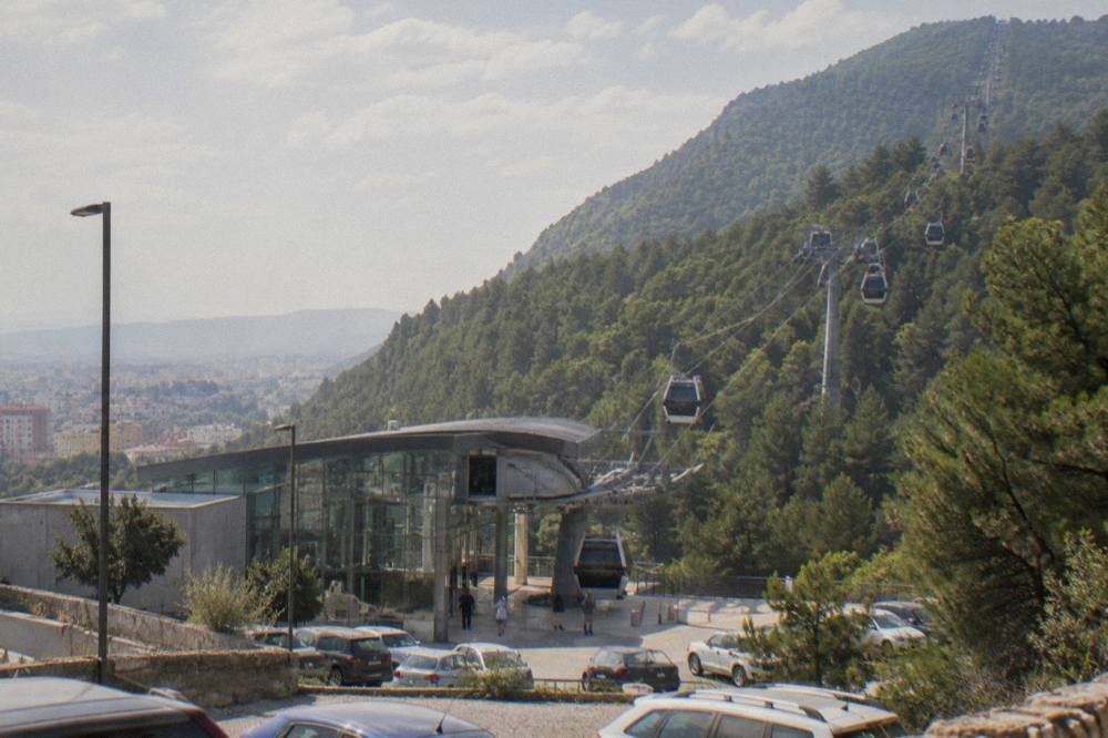 The Dajti Ekspres cable car cabins above pine forest on the slopes of Mount Dajti above Tirana