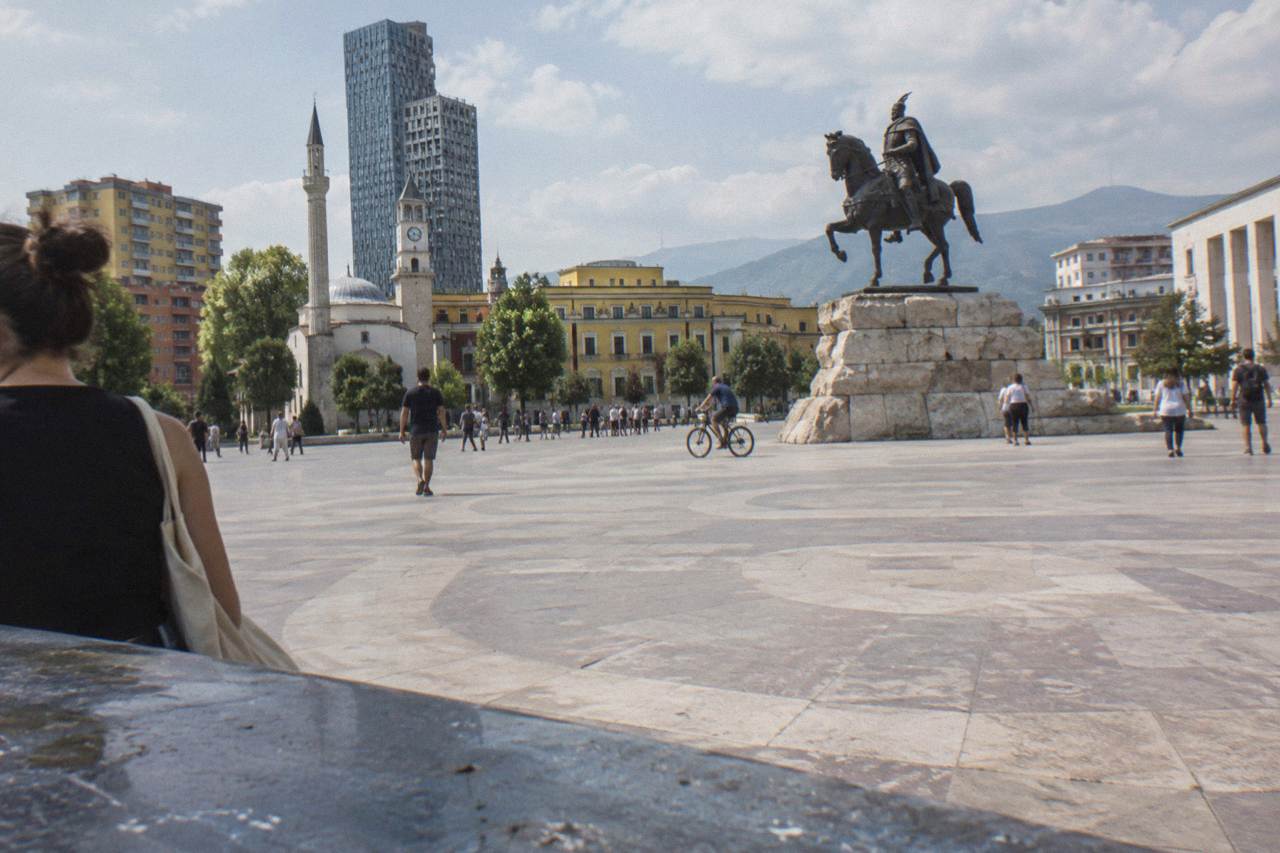Skanderbeg Square in Tirana with the equestrian statue and ministry buildings around the plaza
