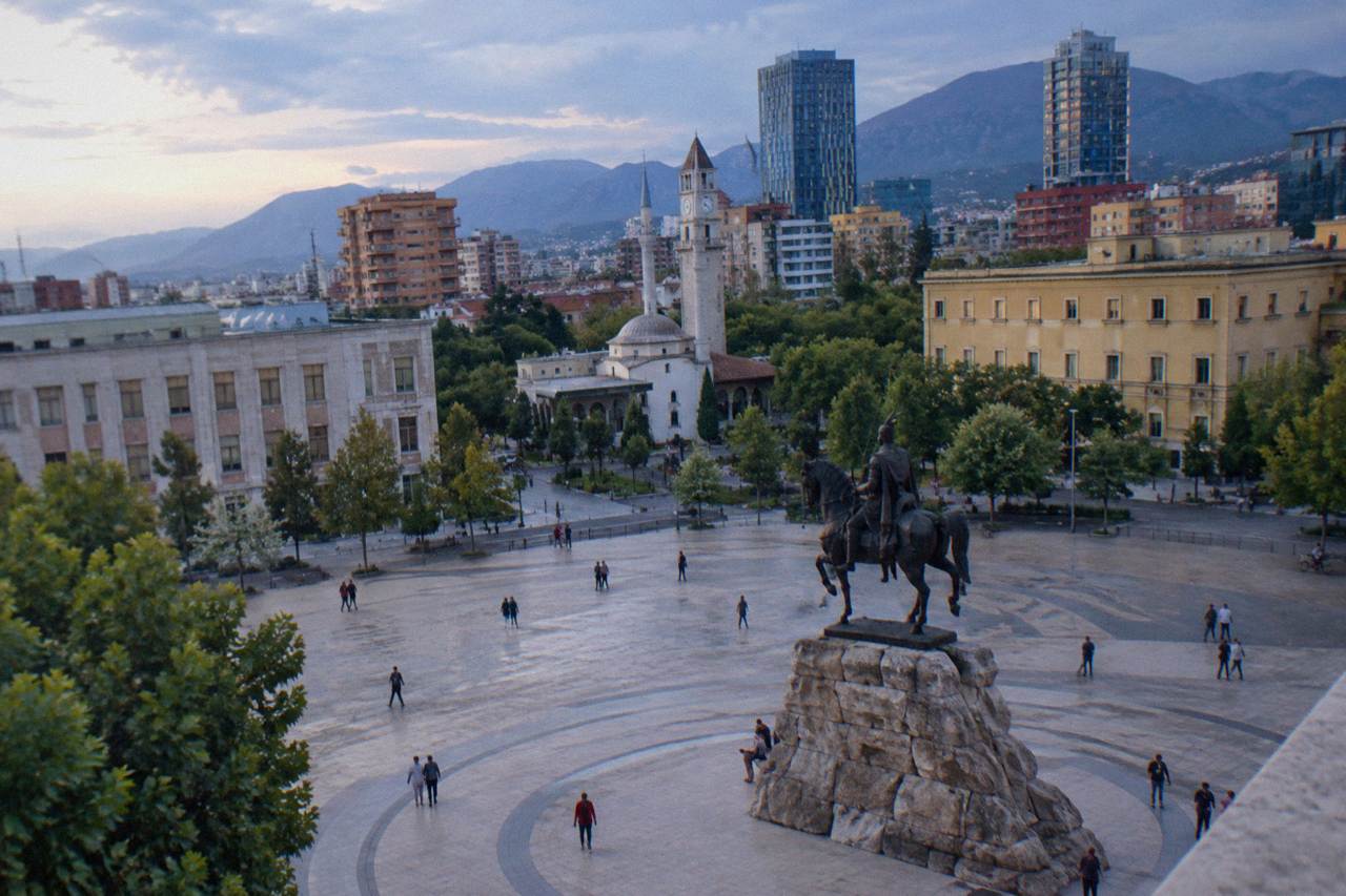 Skanderbeg Square in Tirana with the equestrian statue and the Clock Tower behind it