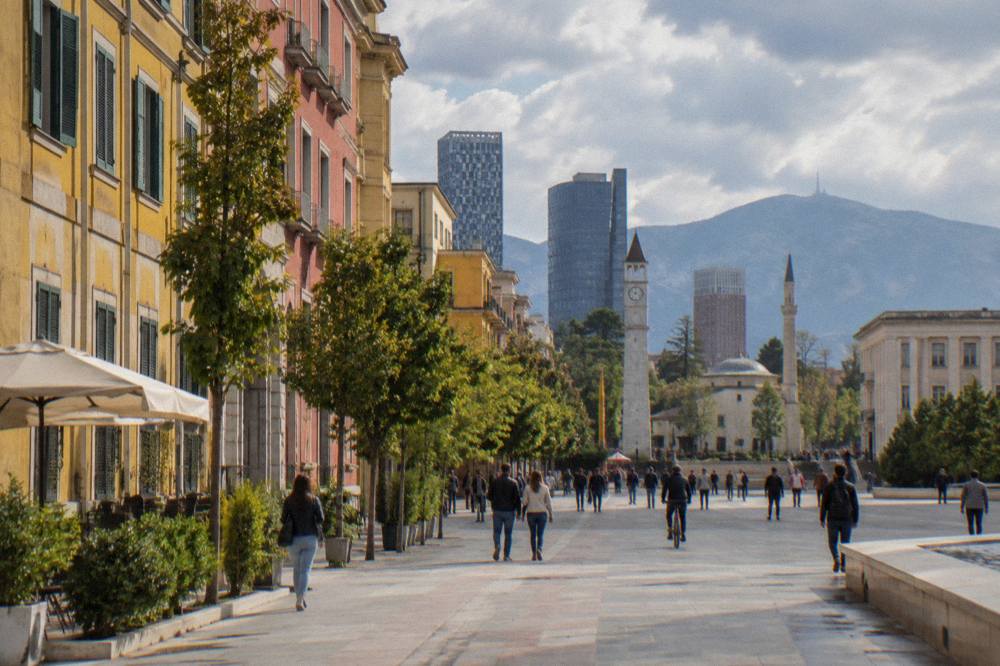 Colourful facades of buildings on a street in central Tirana
