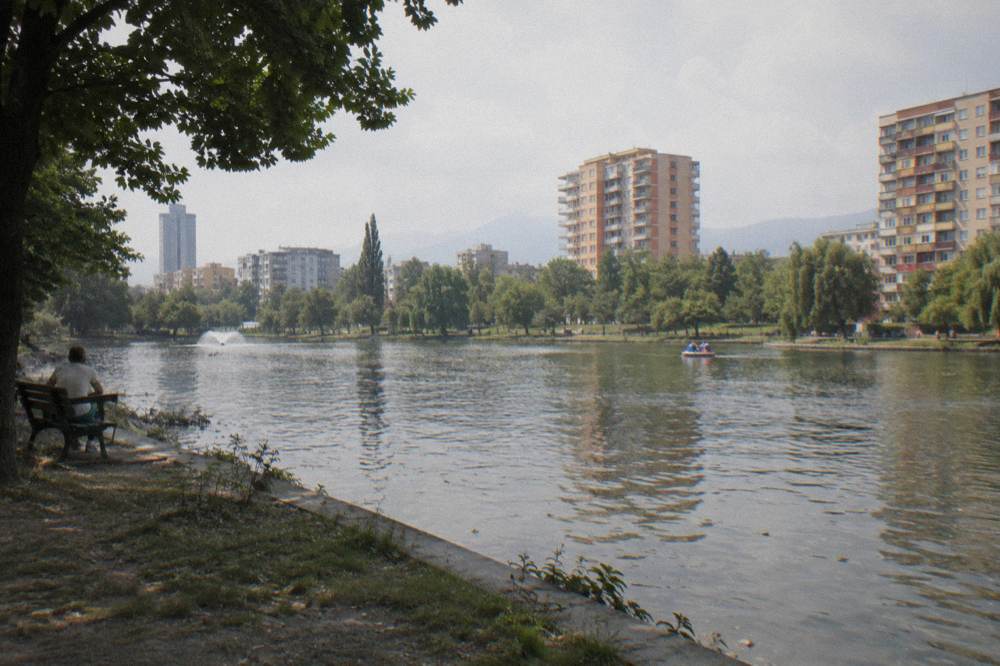 Apartment blocks and green trees in a residential Tirana neighbourhood