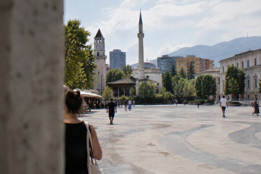 A walking route through central Tirana passing the mosque, the bazaar and a city square