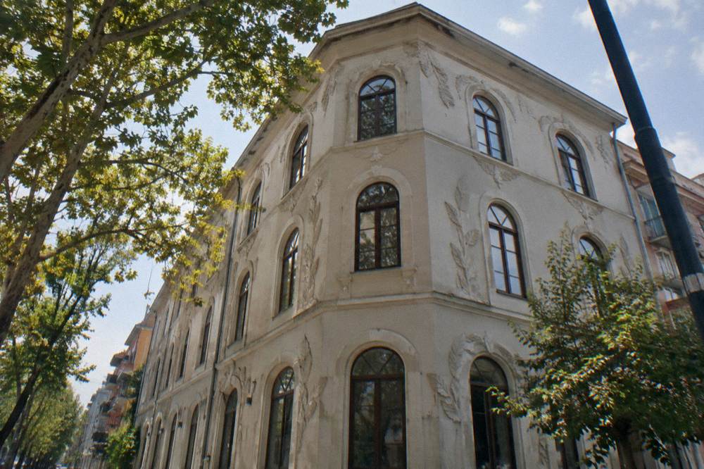 Ornate building facade with a leaf motif