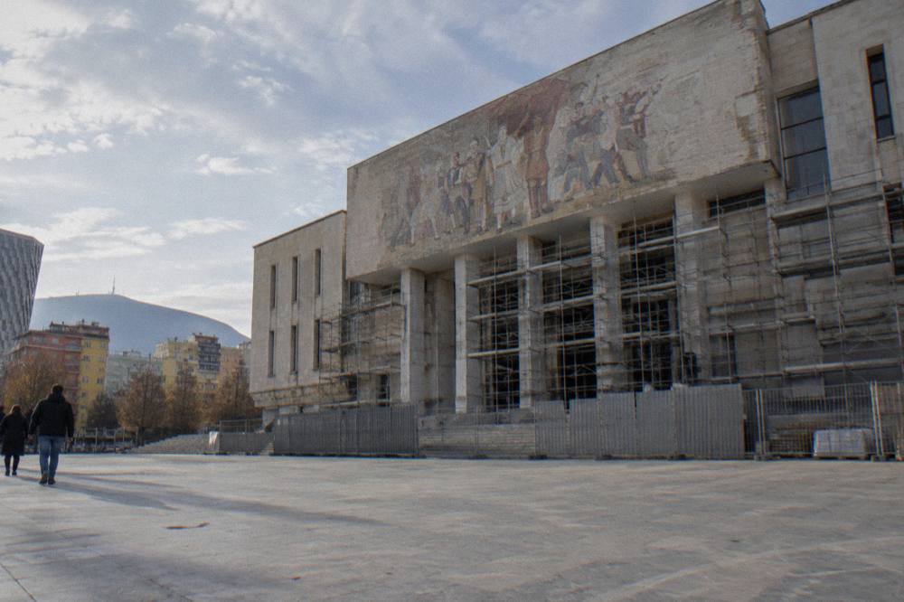Barriers and scaffolding on the front of the National History Museum building in Tirana