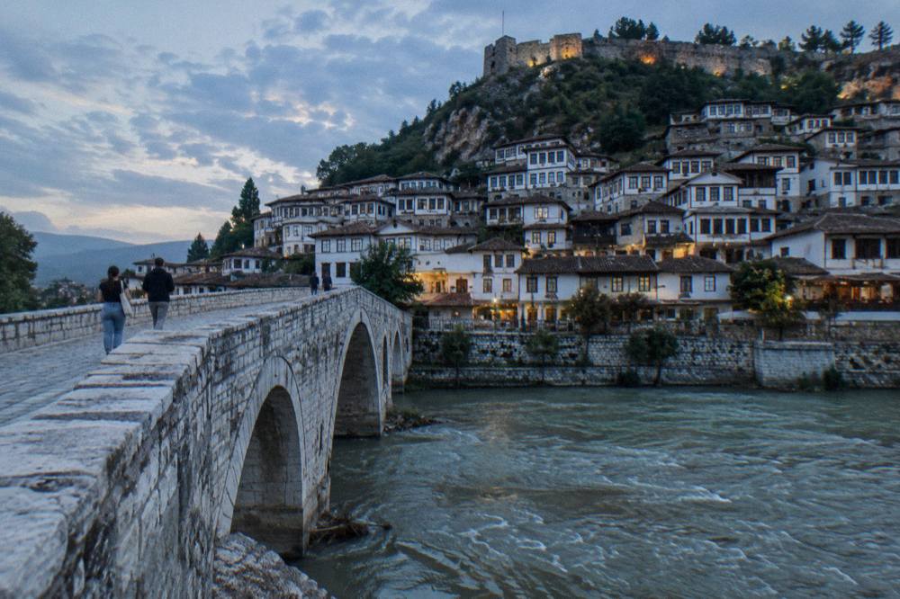 A stone bridge crossing the Osum river toward the Mangalem quarter of Berat