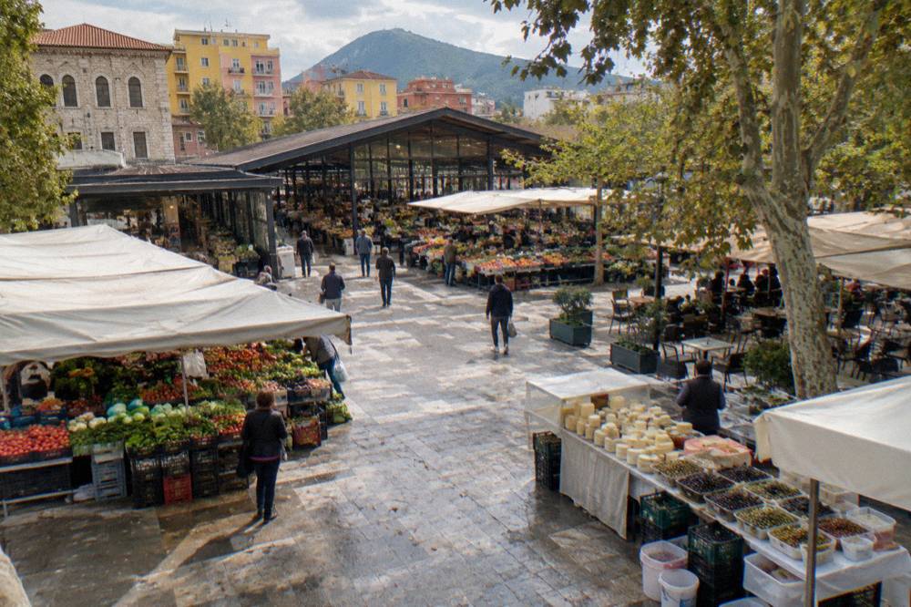 Market stalls with vegetables, cheese and olives at the New Bazaar in Tirana