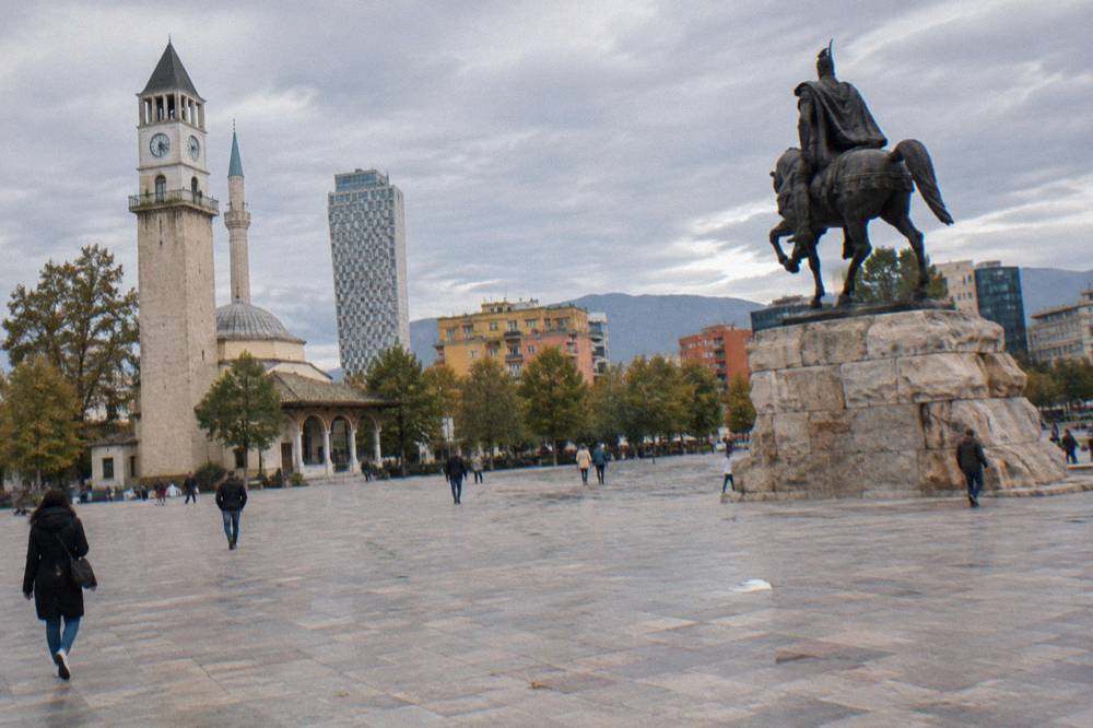 The equestrian statue of Skanderbeg on the pedestrian stone plateau of Skanderbeg Square