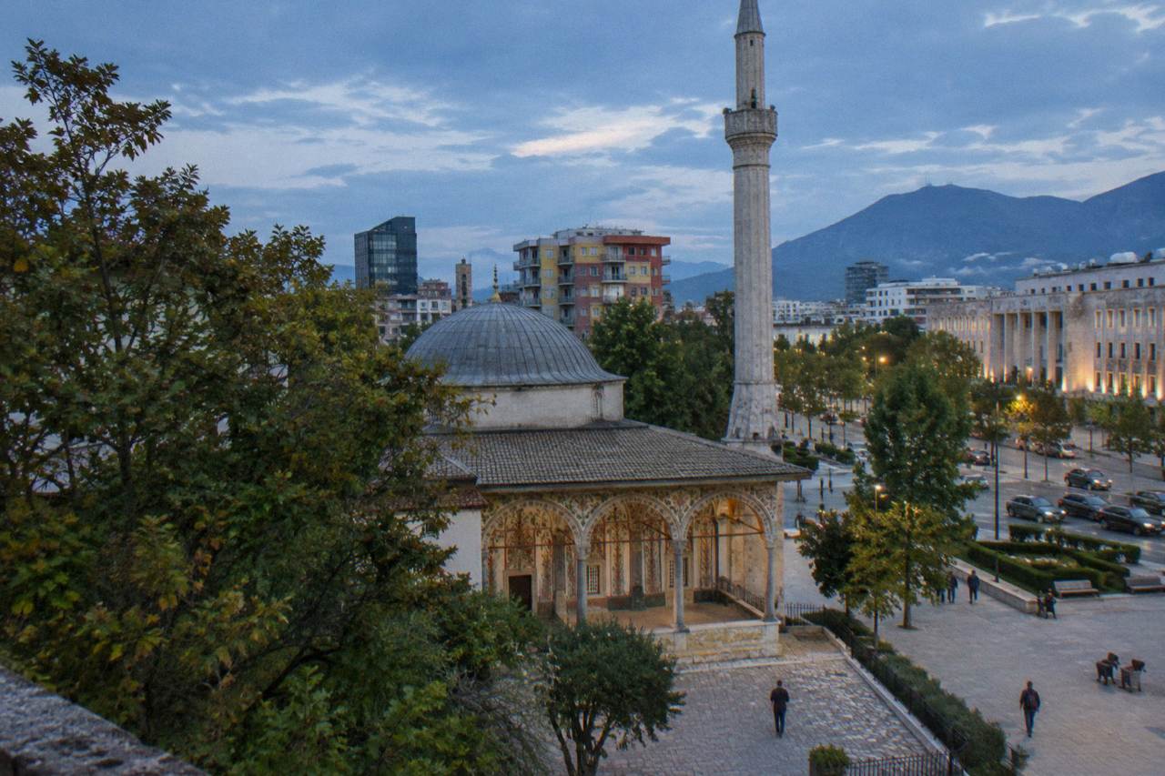 The frescoed portico and minaret of the Et'hem Bey Mosque beside Skanderbeg Square in Tirana