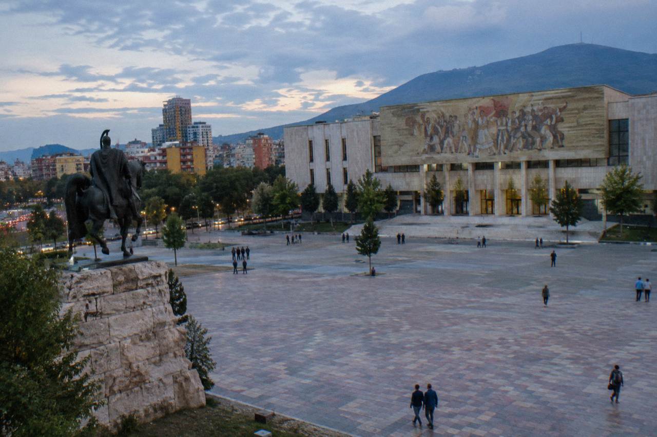 Skanderbeg Square in Tirana with the equestrian statue and the mosaic facade of the closed National History Museum