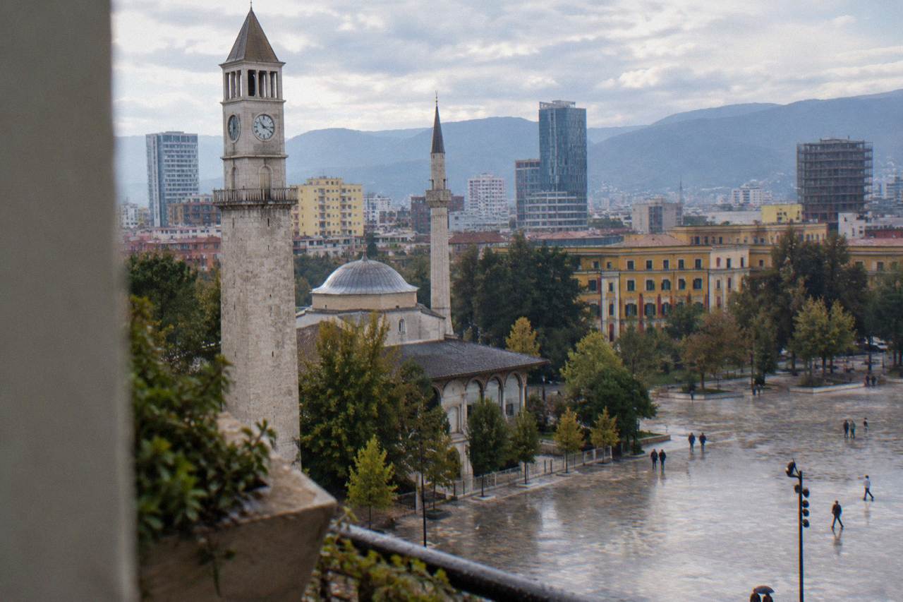 View over Skanderbeg Square in Tirana with the Clock Tower and city rooftops