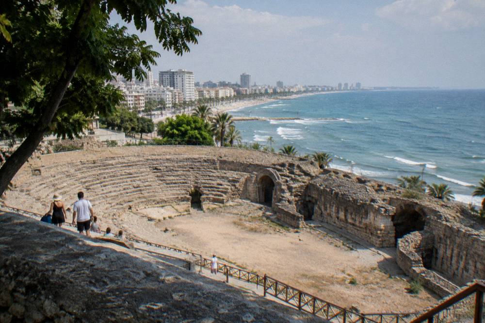 Ancient stone walls and arched passages of a Roman amphitheatre in Durres