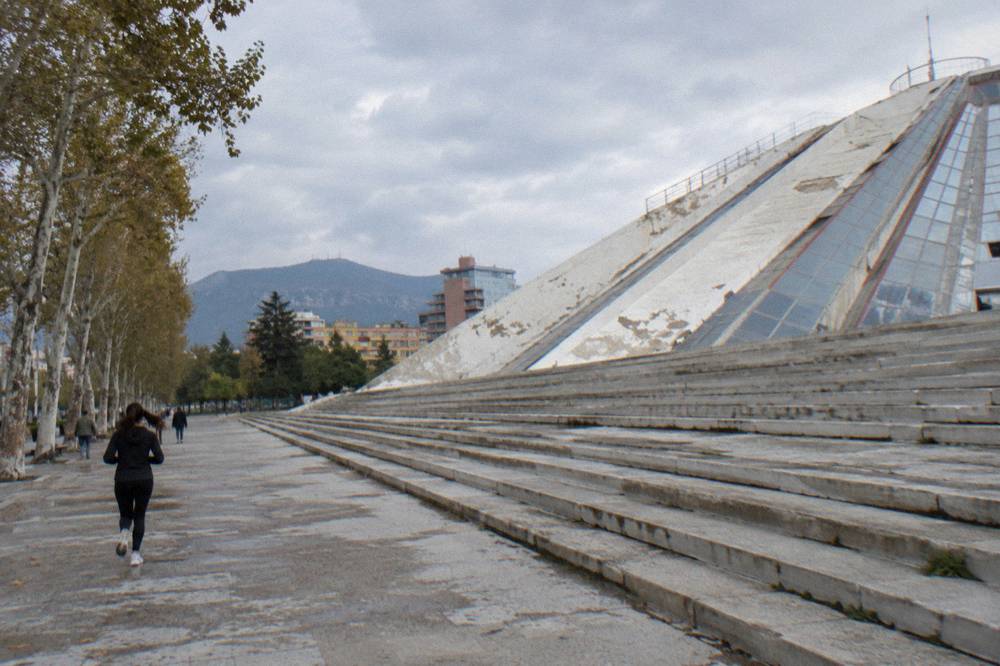 The sloped steps of the renovated Pyramid of Tirana under an open sky