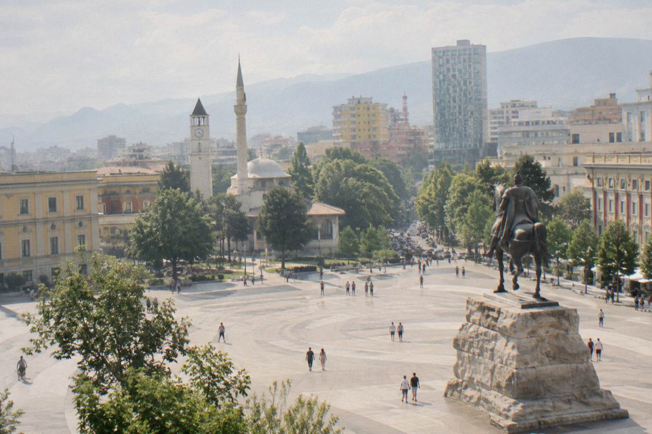 Skanderbeg Square in Tirana with the equestrian statue and ministry buildings around the plaza