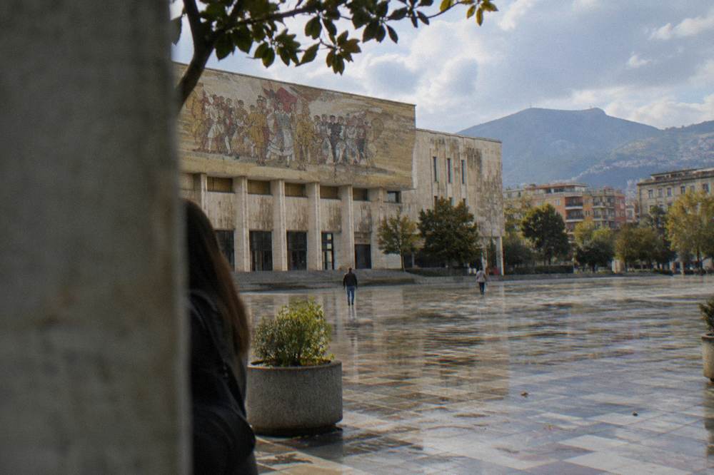 The mosaic facade of the National History Museum on Skanderbeg Square seen from the plaza