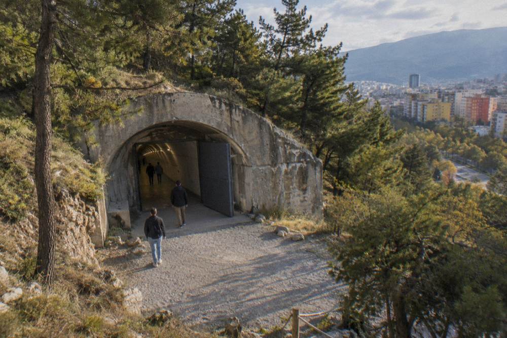 A concrete bunker tunnel corridor lit for a museum display